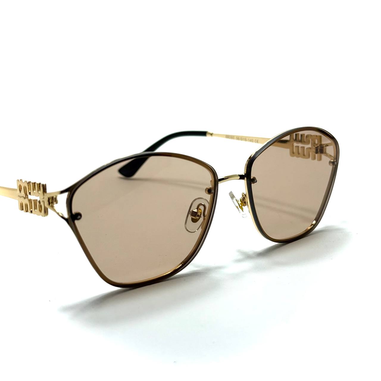 Miu Miu Cat-Eye Metal – Gold / Champagne Bronze