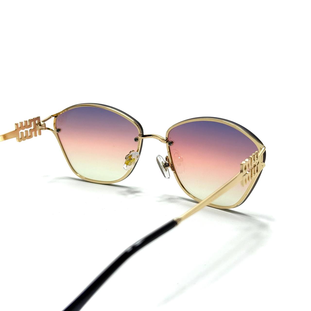 Miu Miu Cat-Eye Metal – Gold / Sunset Gradient