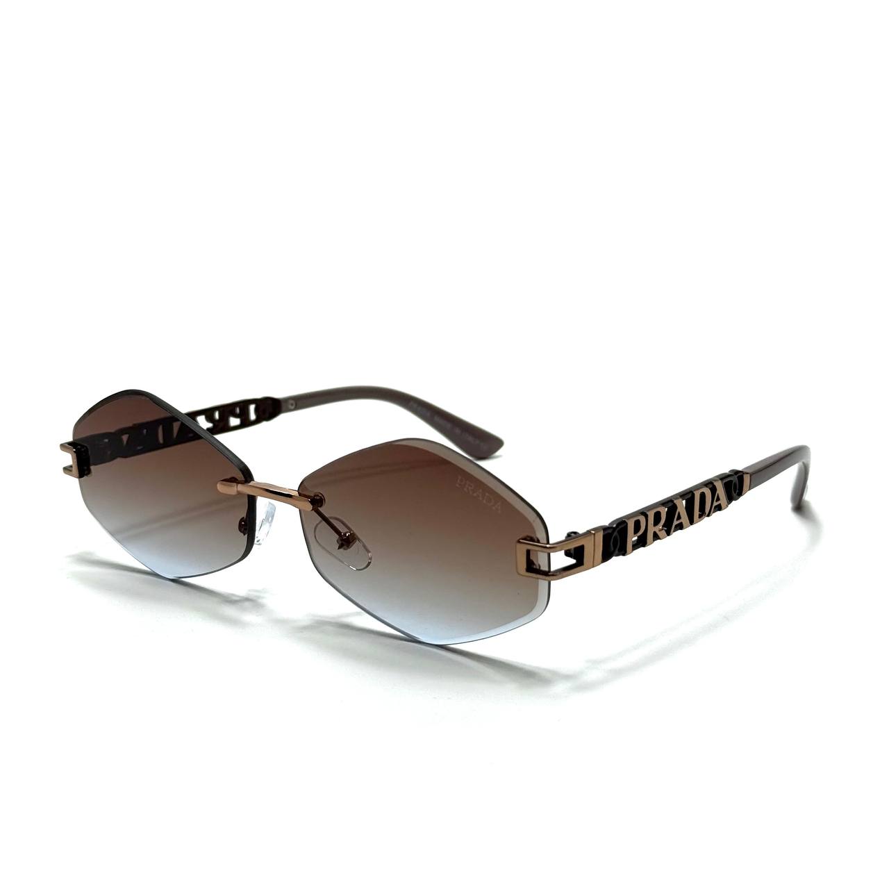 Prada Geometric Rimless Sunglasses – Gold / Brown Gradient